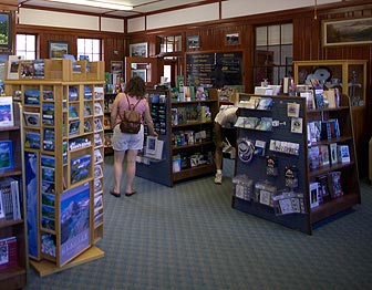 A visitor views merchandise in the Glacier Association Bookstore