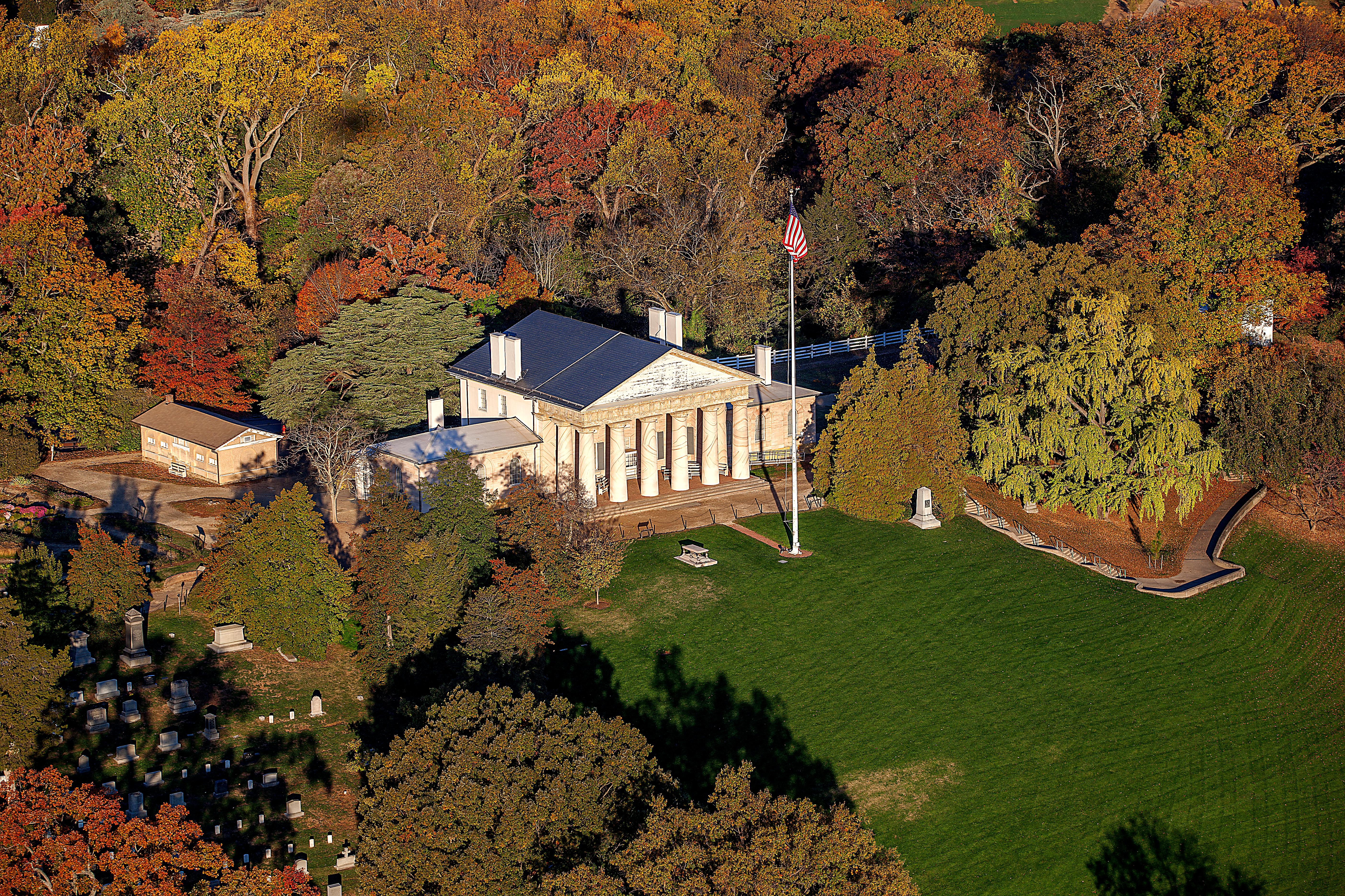 Aerial view of Arlington House surrounded by fall foliage.