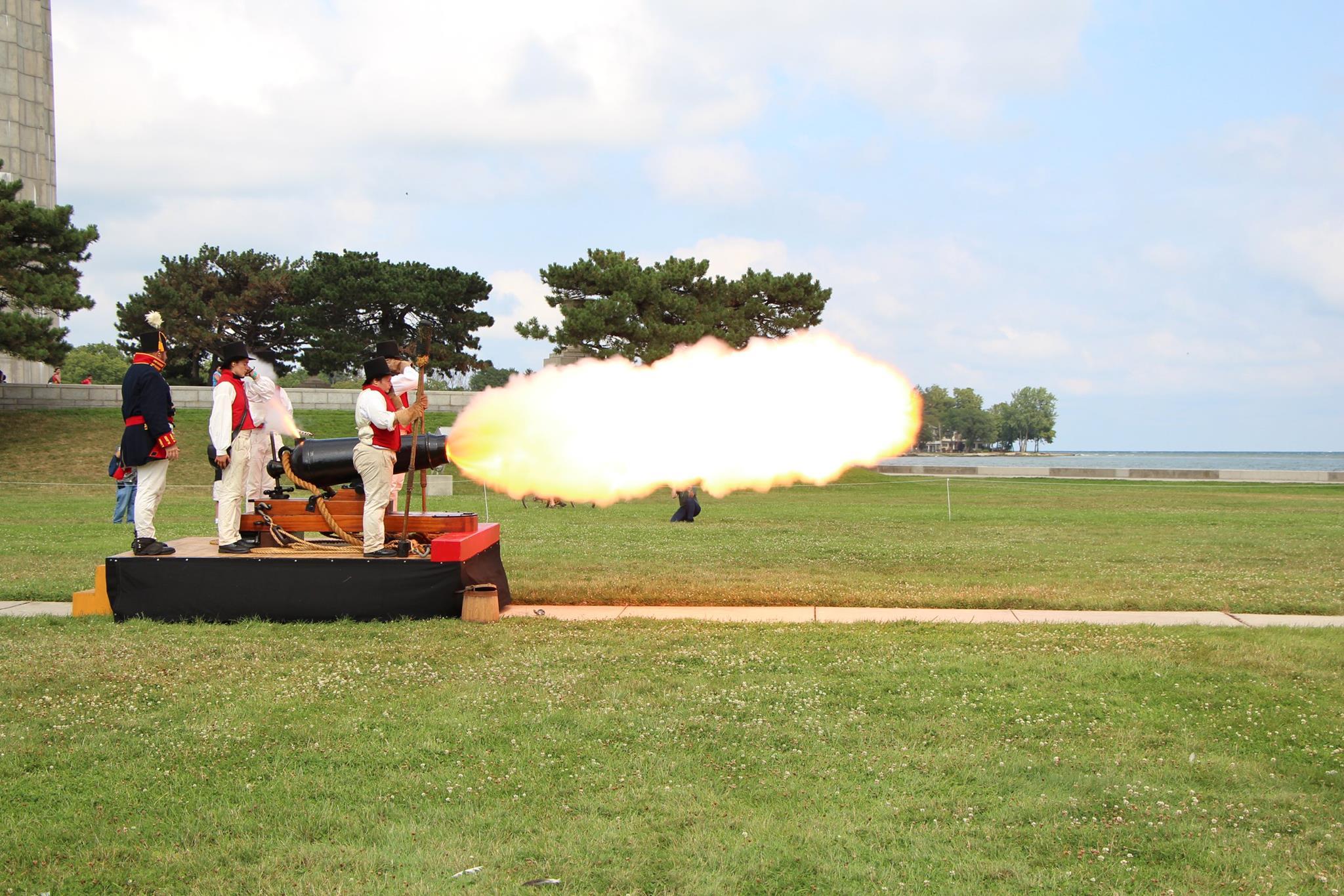 Carronade fires with 5 people standing around it. Fireball from muzzle is 10 long and 4 foot tall.