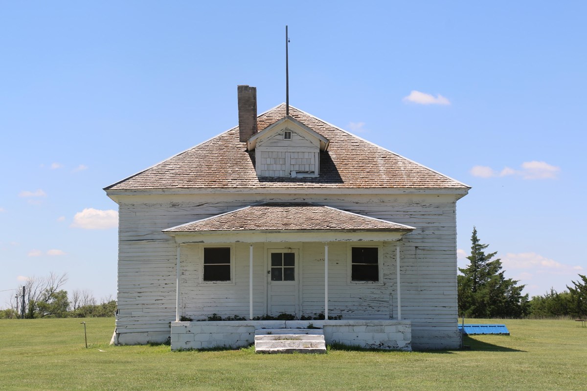 A wooden building painted white
