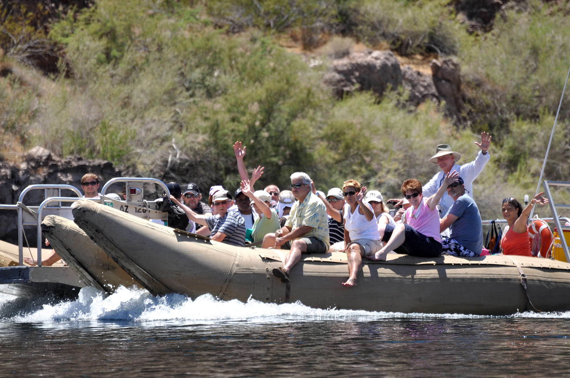 people on a tour operated craft exploring the lake.