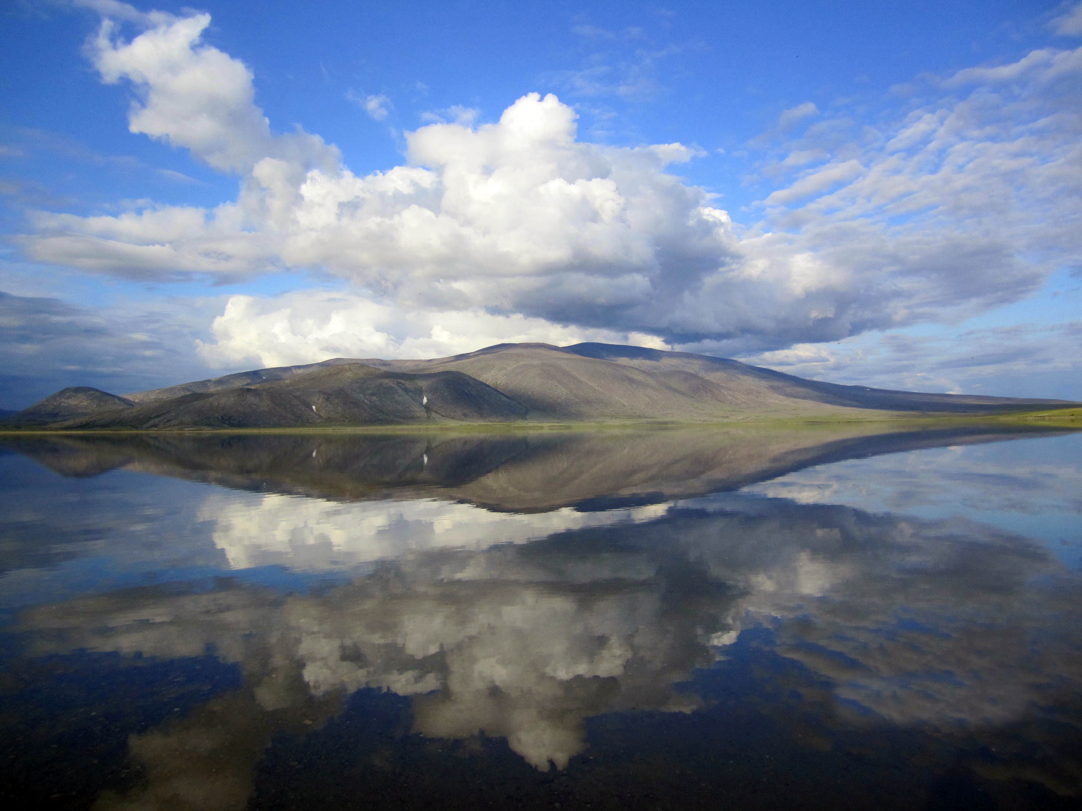 mountain refection on calm lake