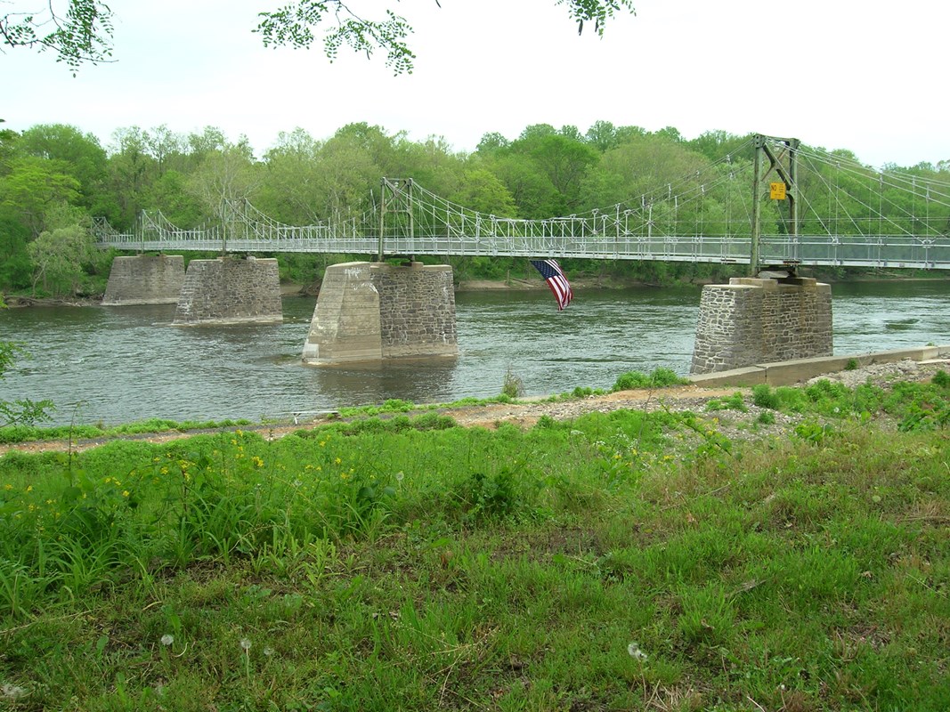 An old stone-pier bridge over a river