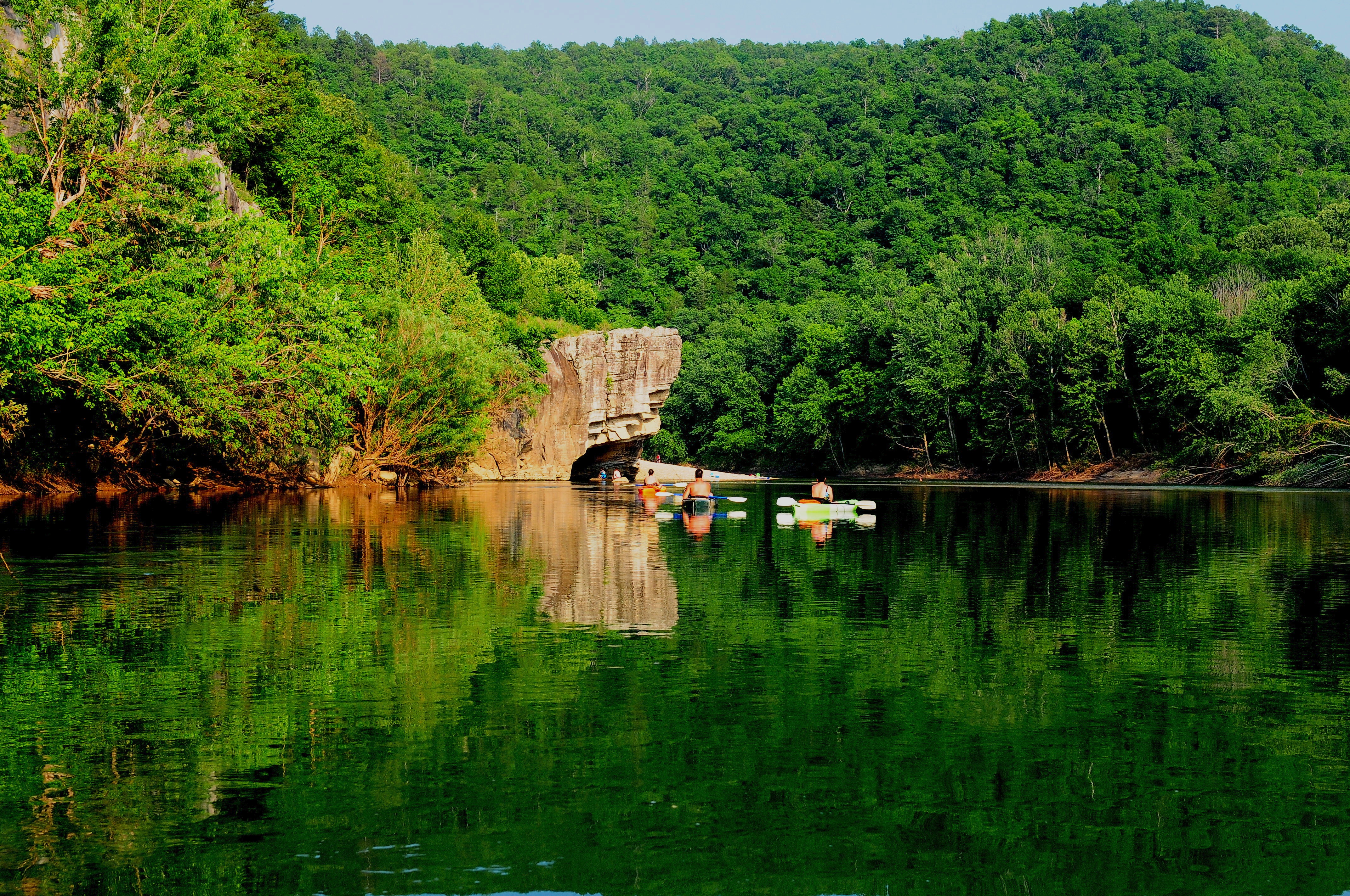 Kayakers floating towards Skull Rock near Buffalo Point.