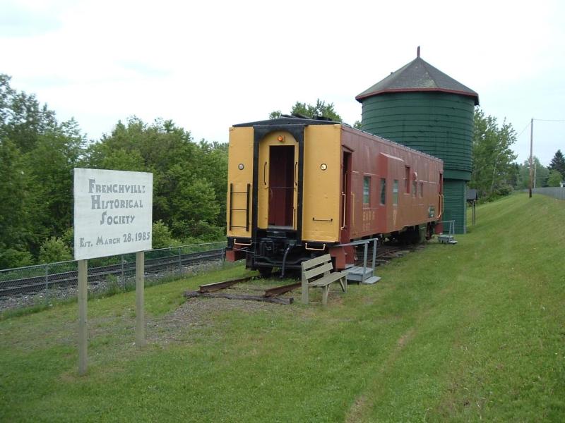 This site preserves one of a few surviving train water tanks in the United States and a 1940s era ca