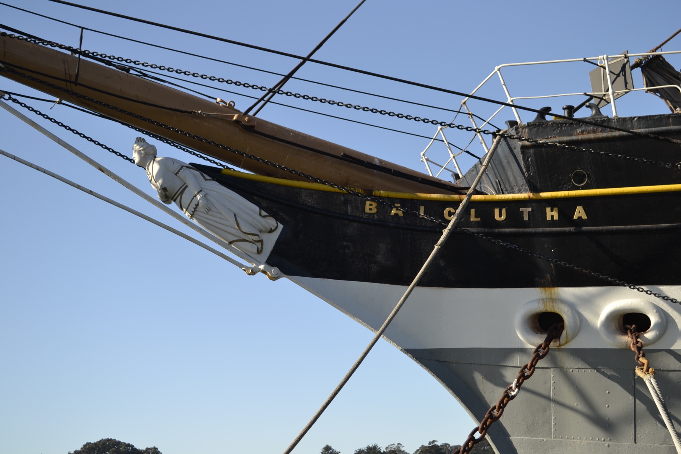 A close up of a spar on the bow of a sailing ship.