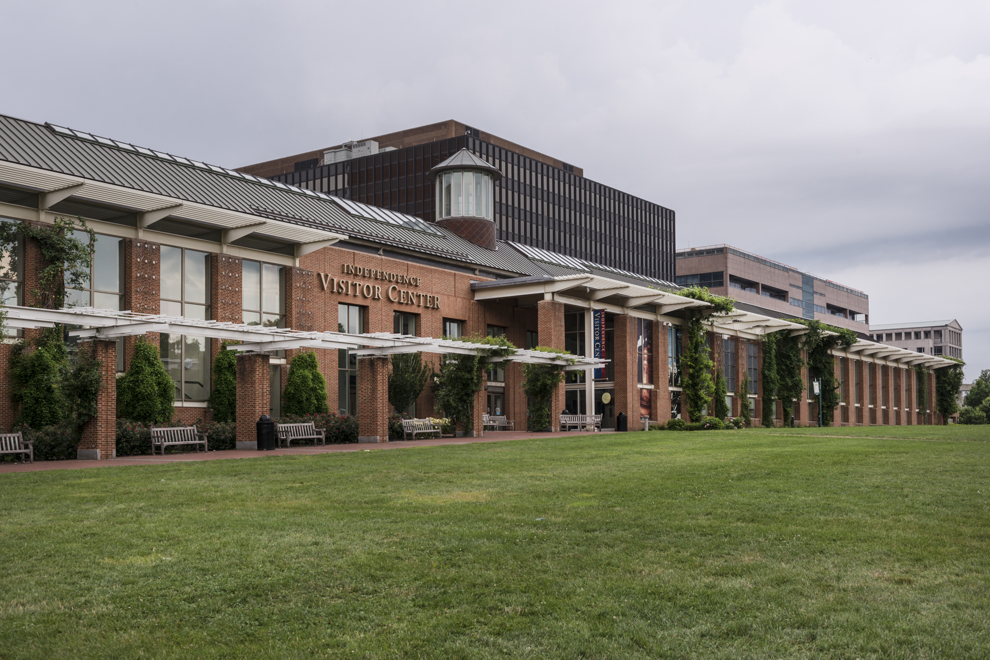 A color photo of the Independence Visitor Center showing a brick building with tall windows.