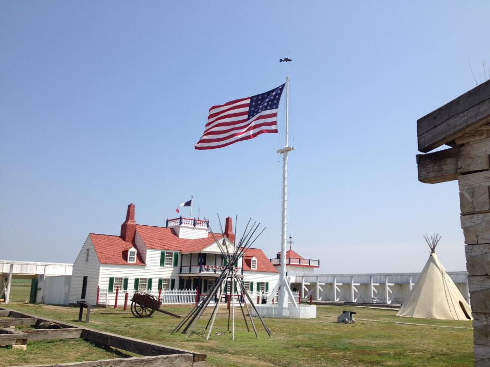 Courtyard of Fort Union Trading Post with Bourgeois House, Tipis and US Flag