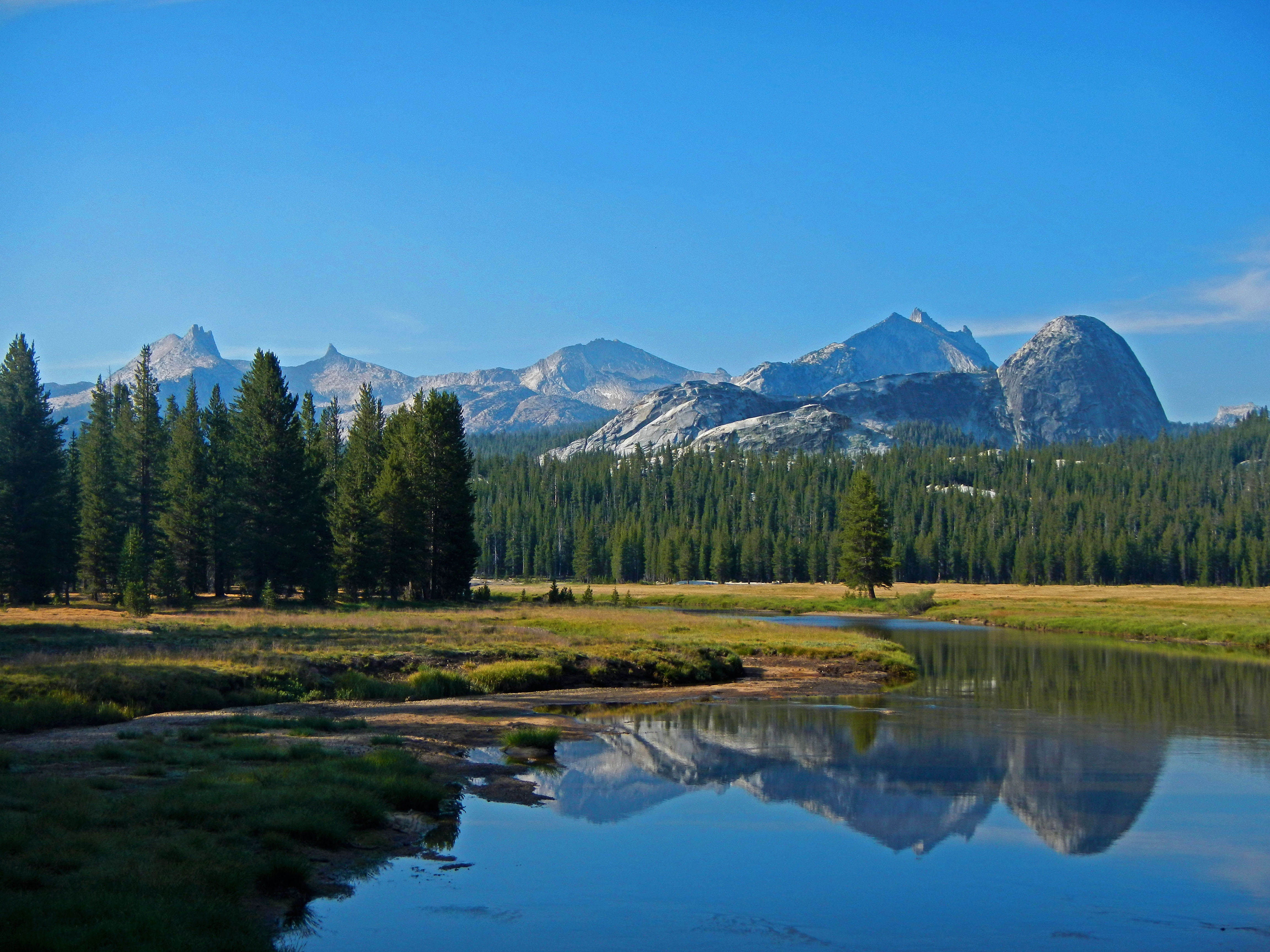 Mountains reflecting in water