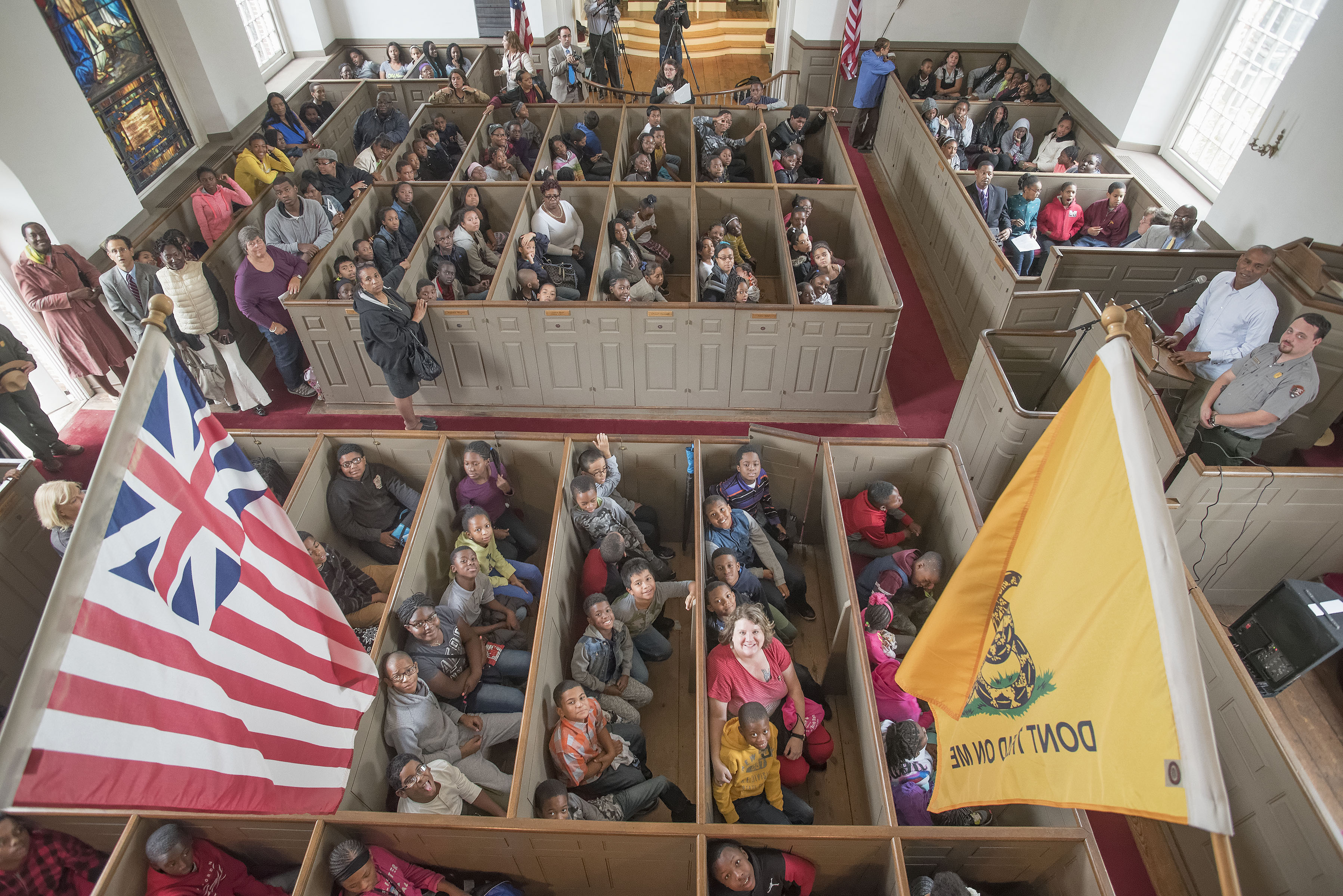 Local students gather inside Saint Paul's Church