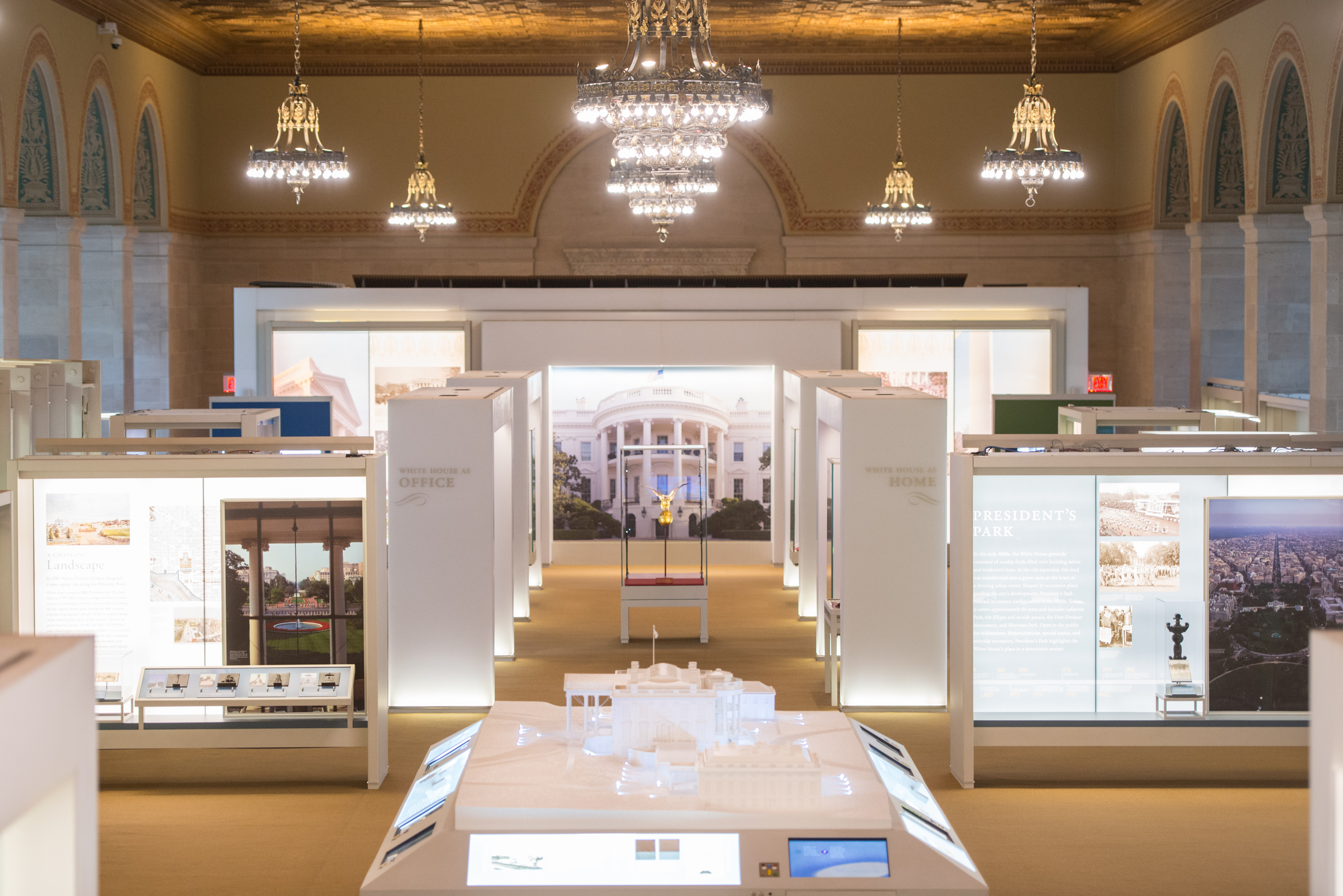 White House model and exhibit cases inside the visitor center