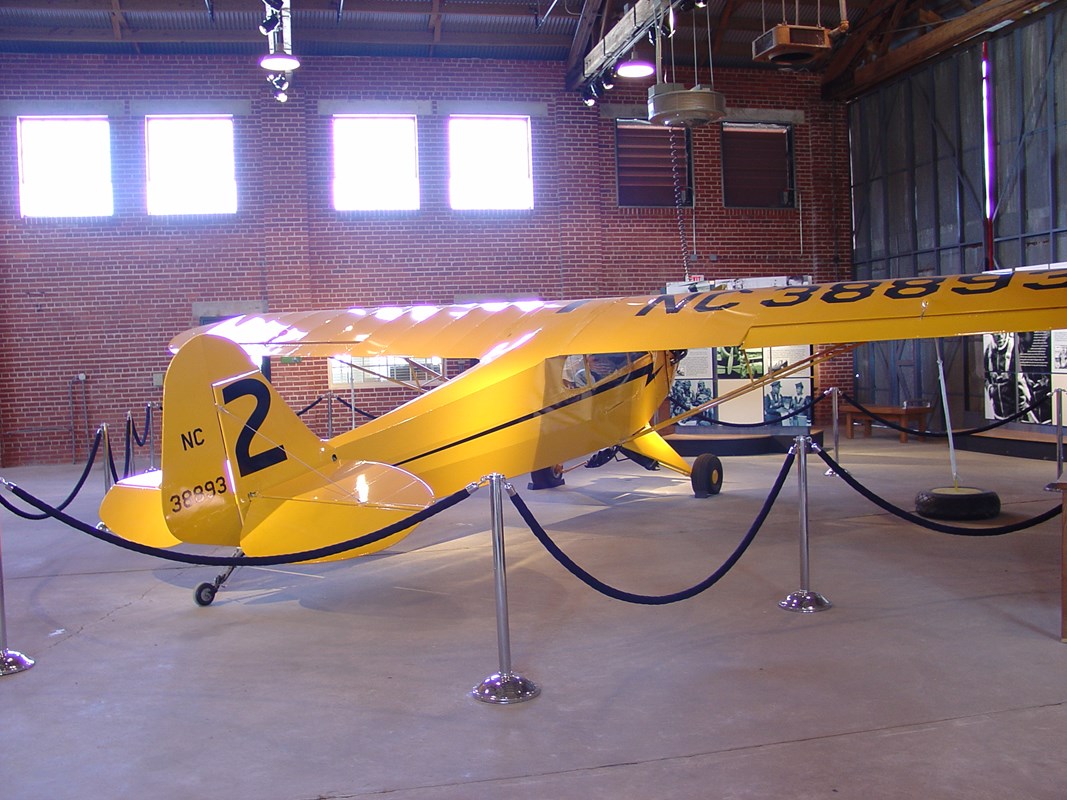 Small Yellow training plane used in the Civilian Pilot Training Prograj - J3 Piper Cub 