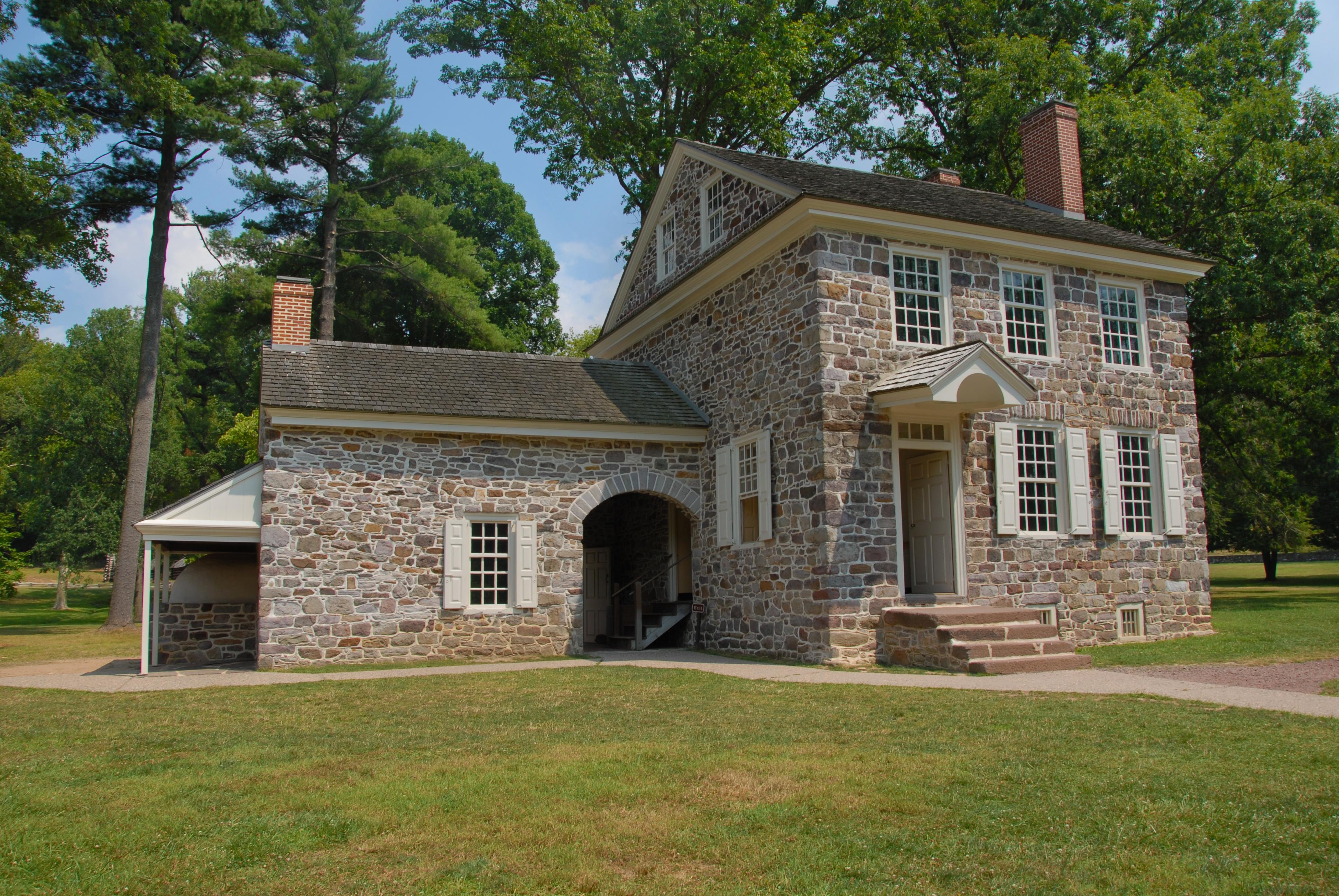 outdoors, grass, trees, stone house, blue sky