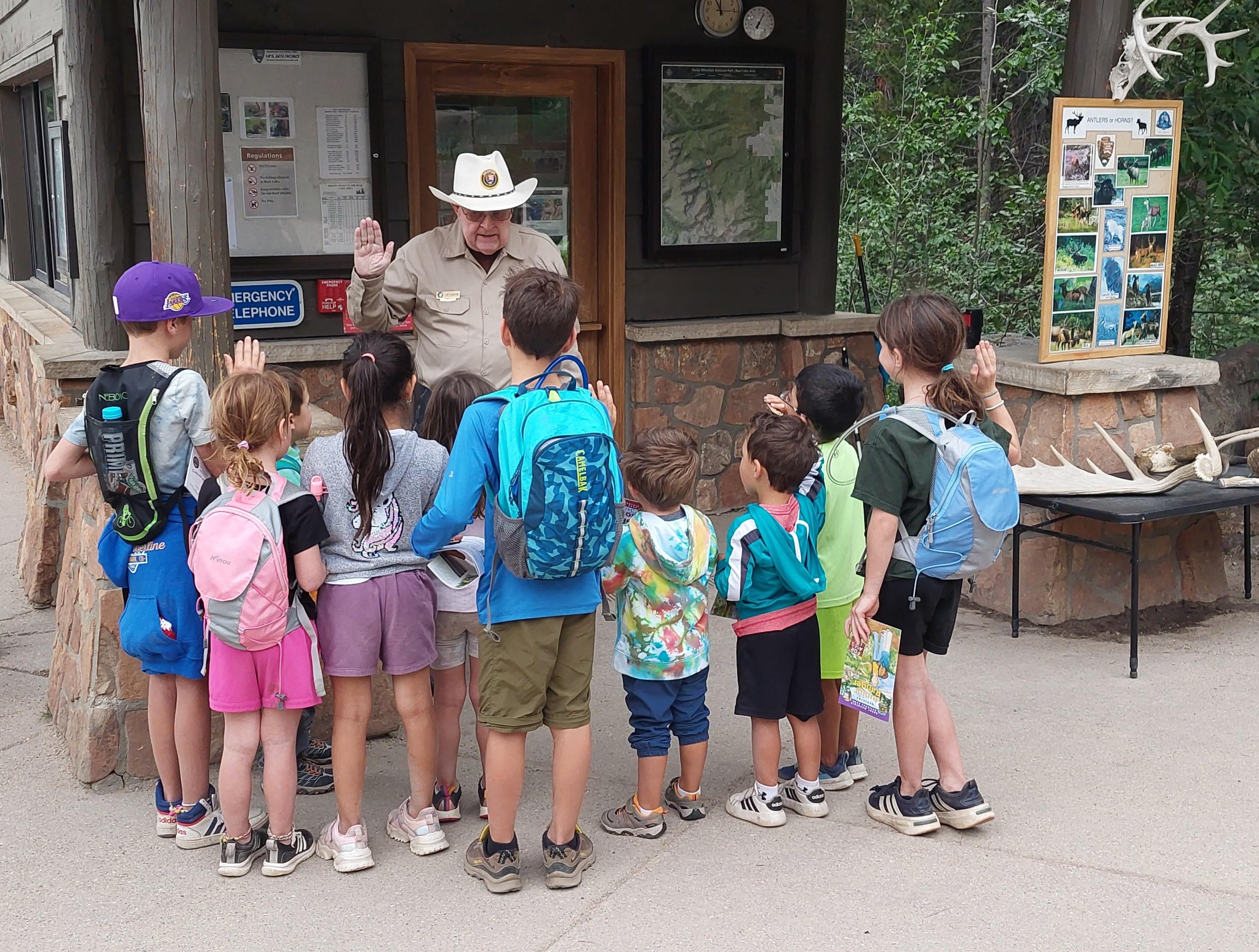 A group of Junior Rangers are earning their new badges