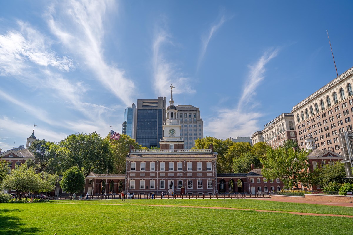 Color photo of Independence Hall as seen from the north side of Chestnut Street.  