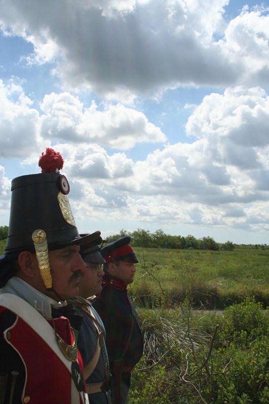 Three living historians in Mexican War era military uniforms