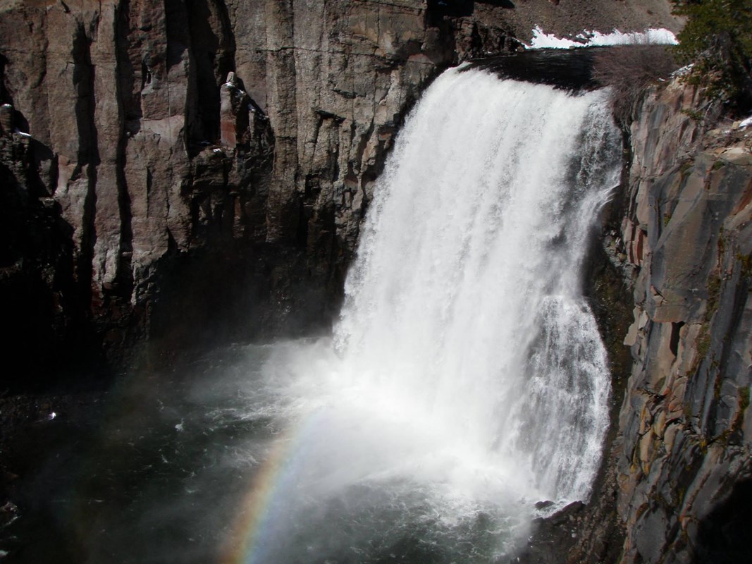 Waterfall with faint rainbow 
