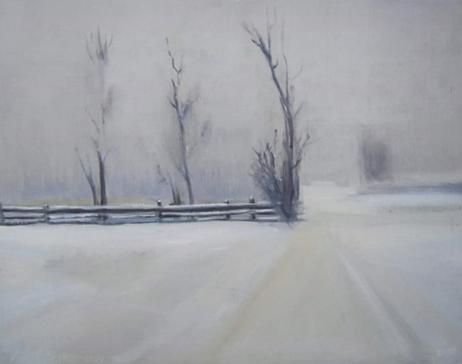 Snowy landscaped with post fence and three bare trees.