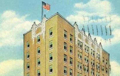 Historic postcard of a nine-story masonry hotel.