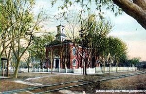 This is an image of an early color postcard of the Courthouse, from ca. 1900. Photo: Courtesy, George Kramer.