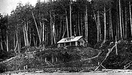 This is an image of the Southwest view of West's log house just after construction in July, 1913. Photo: Courtesy, Harriet Drake.
