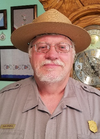 Man with ranger uniform with glasses and white goatee