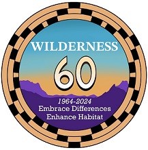 Round graphic incorporating a basket design and mountains with the text: Wilderness 60 1964-2024 Embrace Differences Enhance Habitat
