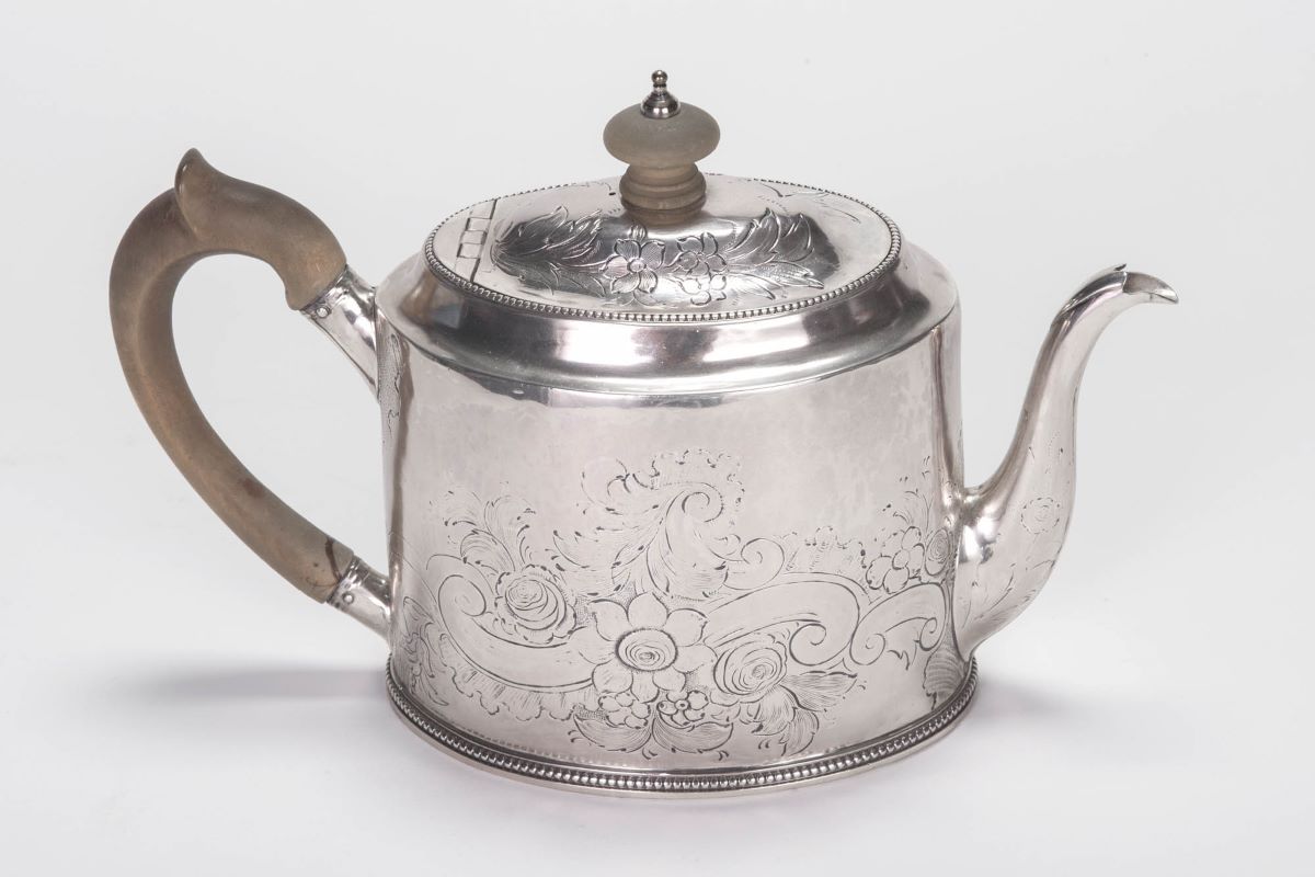 The reverse side of the Hester Bateman teapot.