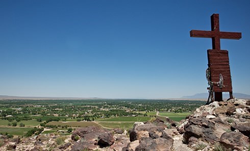 image of a cross on top of a hill