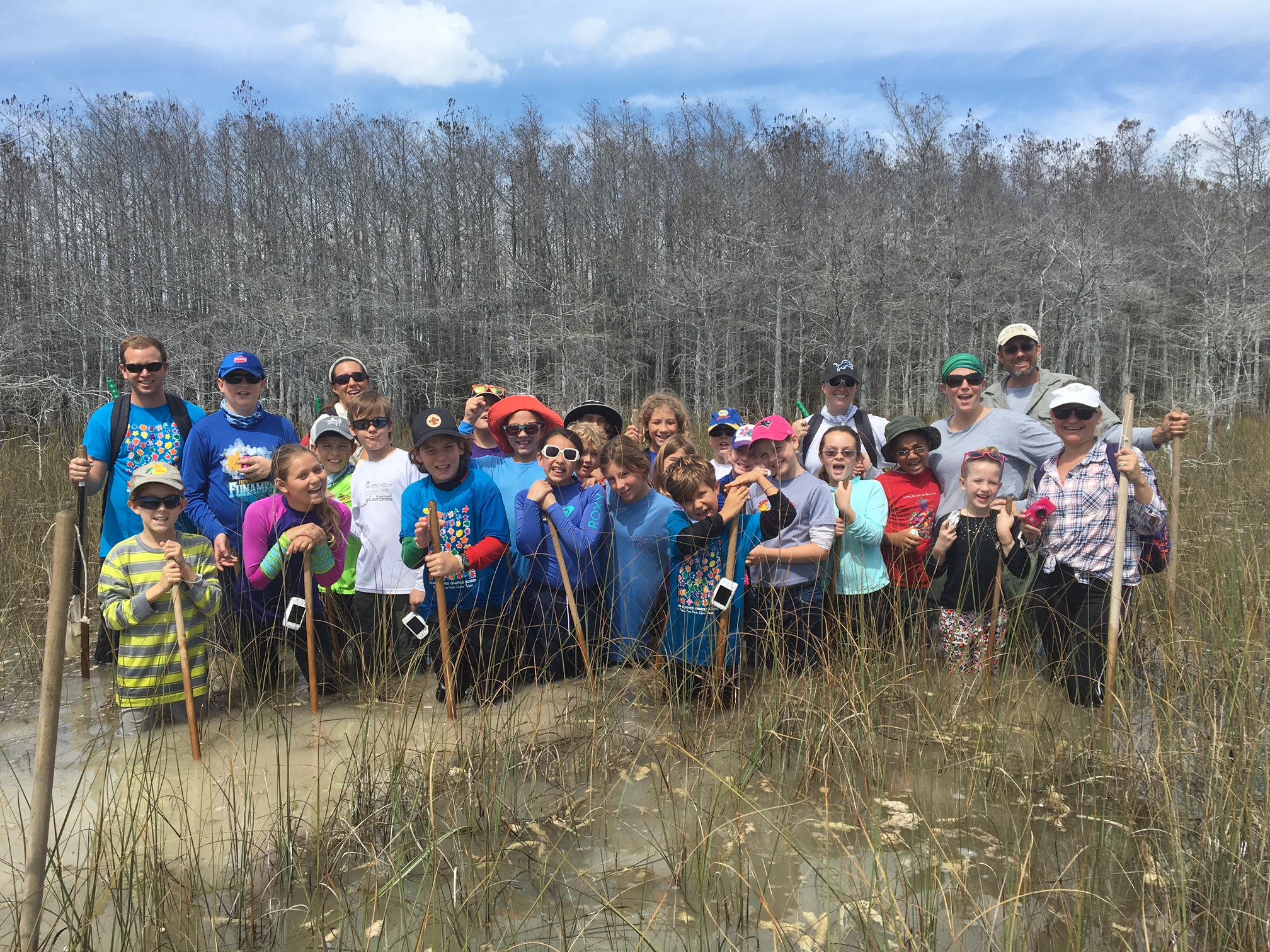 Students on a field trip to create their exhibit, “River of Grass: Flowing Through the Generations”