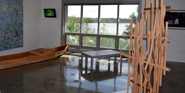 Dugout canoe and other artwork representing Florida Bay