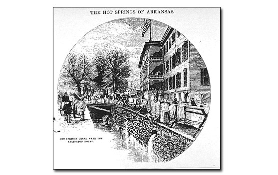 From a reprint of a Harper's magazine, this black on white drawing of the first Arlington Hotel from the south end showing a portion of the building front. The three-story hotel was built on the edge of Hot Springs Creek; the creek was still exposed and not underground as it is today. There is a stone retaining wall with two places where water is draining out from under the hotel. A narrow walkway is between the hotel and the retaining wall and a shoulder high rail is on top of the wall. An African American woman is at the rail hanging blankets across the rail, using it for a clothes line. There is a young African American boy near her and other workmen outside the building as well as some ladies dressed for a stroll. The hotel was wooden with a central porch section; there's an American flag flying atop this part of the building. There are bare trees in the left background and people on the street in front of the hotel, including a mule-drawn cart with passengers.