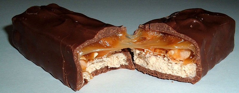 Snickers candy bar cut in half.