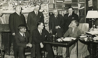 FDR and his Cabinet conducting a meeting.