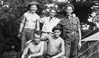 Five men posing for a group photo.