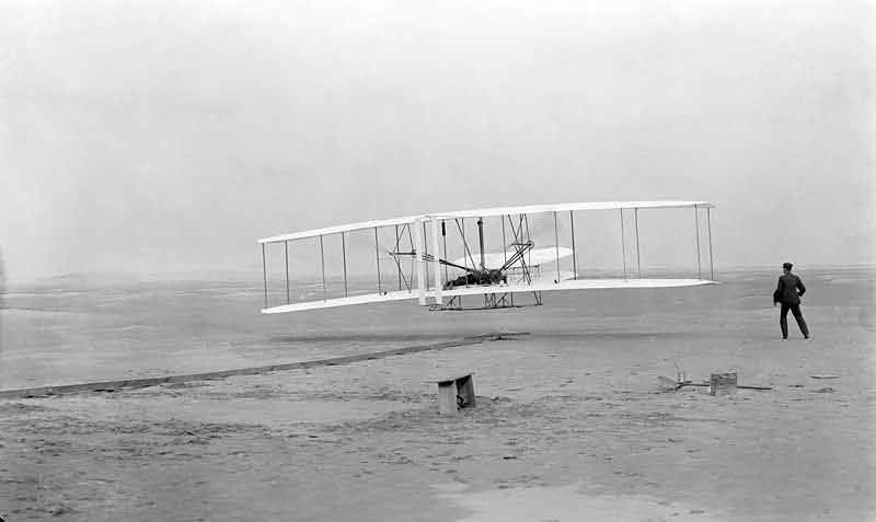 Wright Flyer I during its first flight.