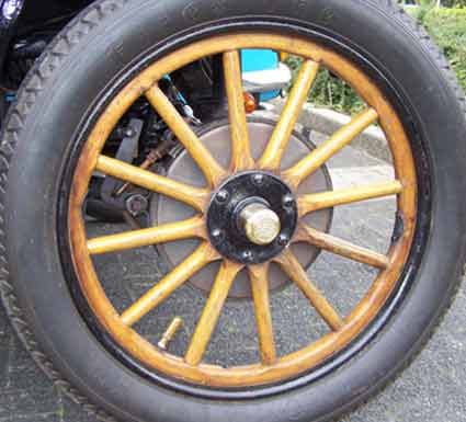 An original wood spoke wheel for an automobile