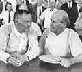 Clarence Darrow and William Jennings Bryan chat during the Scopes trail in 1925.