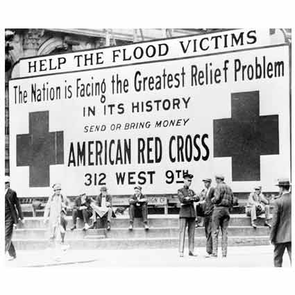 A large banner reading: Help The Flood Victims.