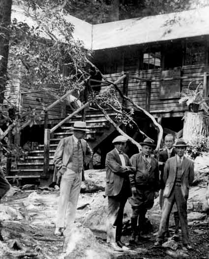 Reporters standing outside the cabin at Rapidan Camp.