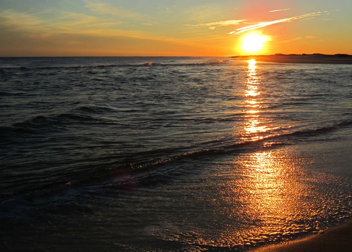 Sunset over the breach at Old Inlet