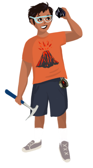 A young Latino boy is wearing safety glasses, an orange shirt with a volcano and blue shorts that have a compass hanging from the belt loop. He is holding up a volcanic rock in one hand while holding a rock hammer in the other hand.