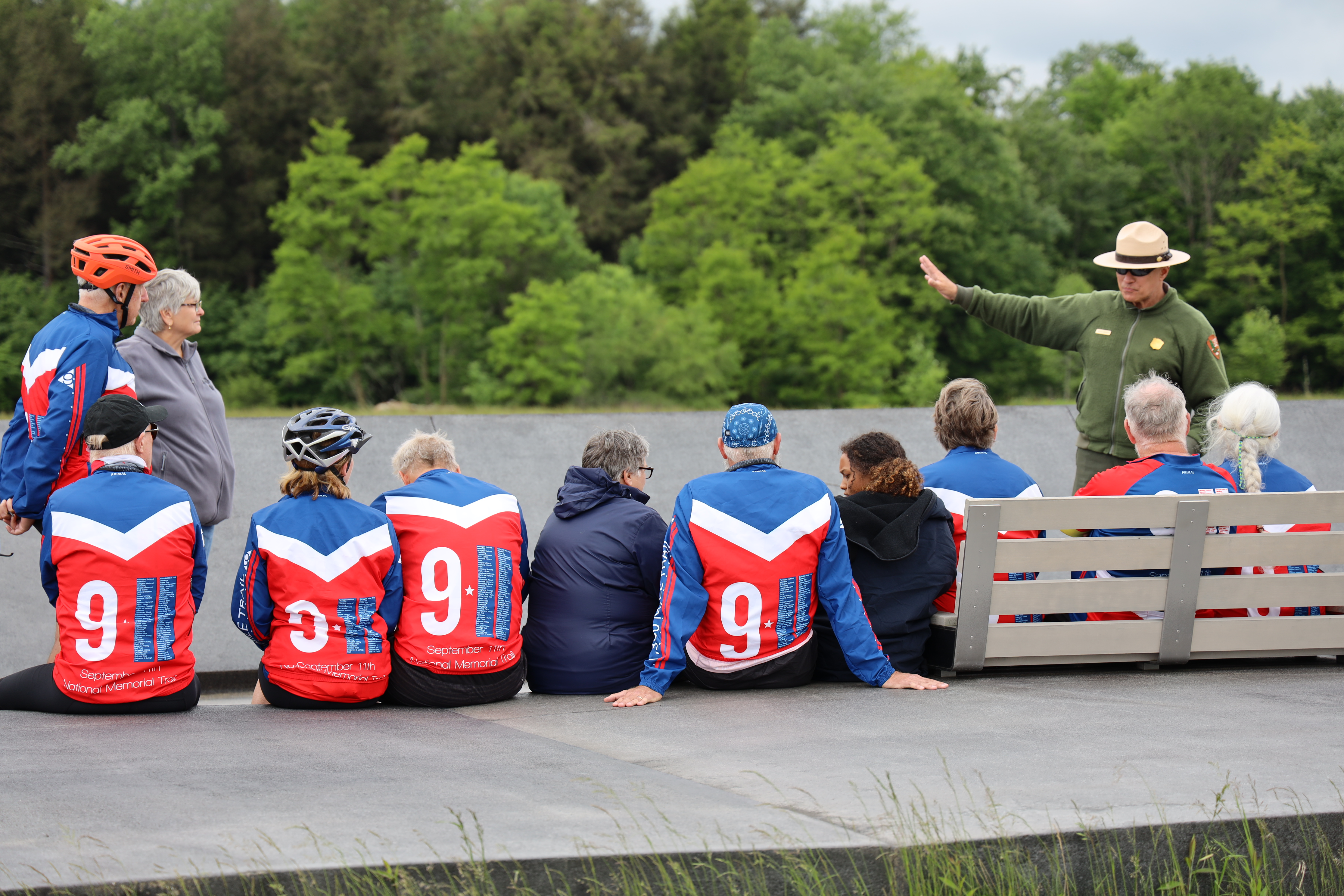 A park ranger gives a presentation to a group of trail riders.