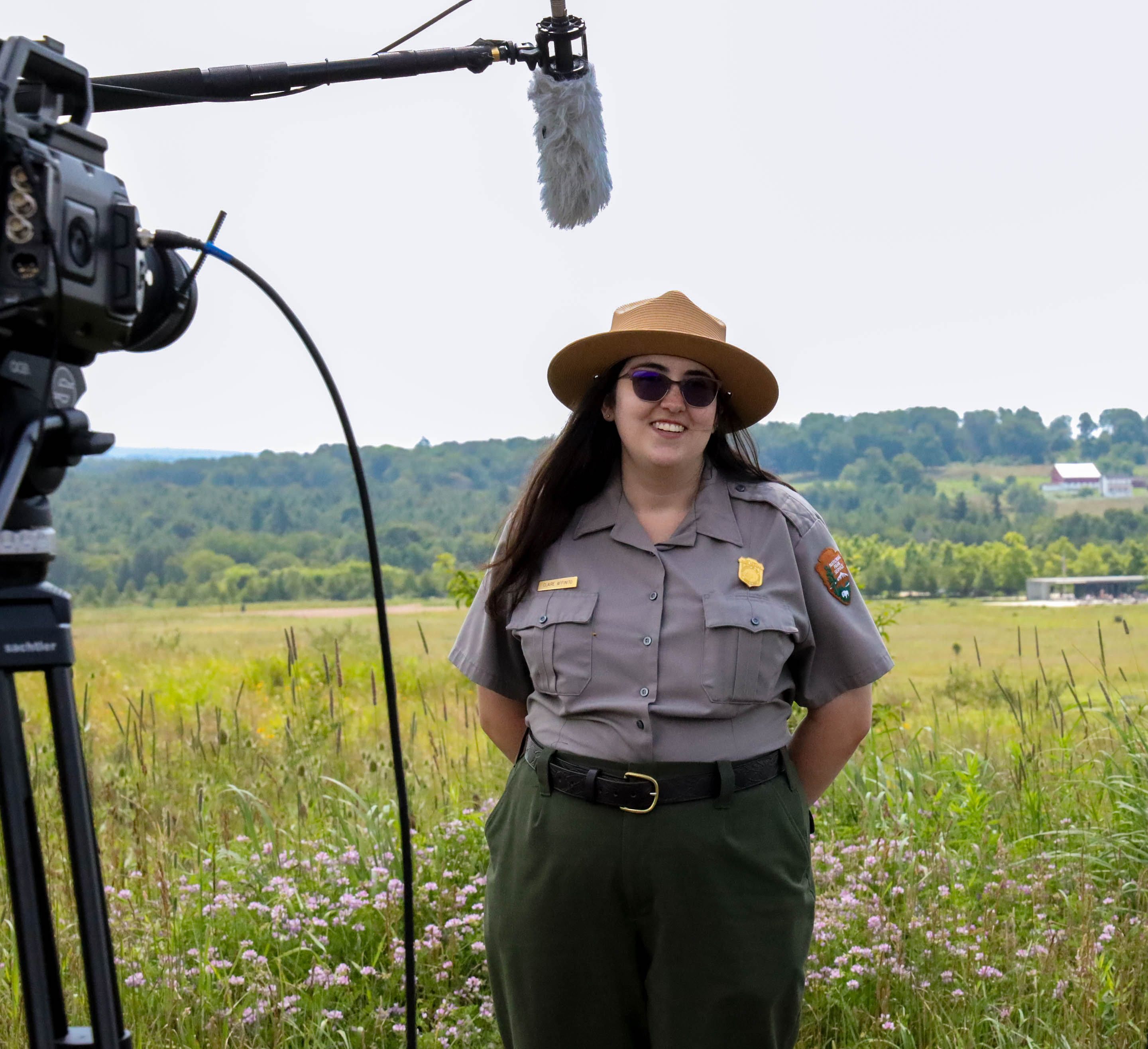 Park Ranger stands in front of a camera at Flight 93 National Memorial