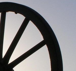 Close up view of a partial wagon wheel.