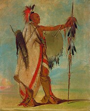 a tall native American with ceremonial Osage clothing