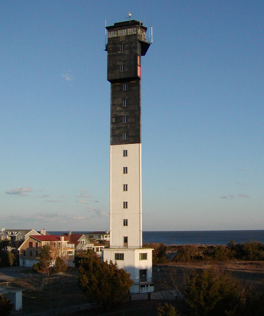 A triangular black and white tower