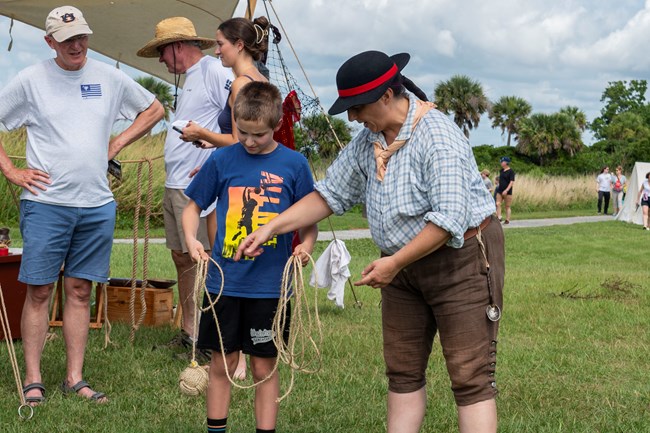 Living historians interact with visitors during Carolina Day events Living historians interact with visitors during Carolina Day events