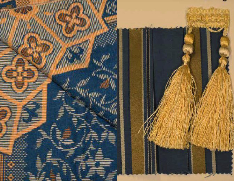 A sample of blue and tan carpet in a geometric pattern. A sample of blue and gold striped fabric and gold tassels.