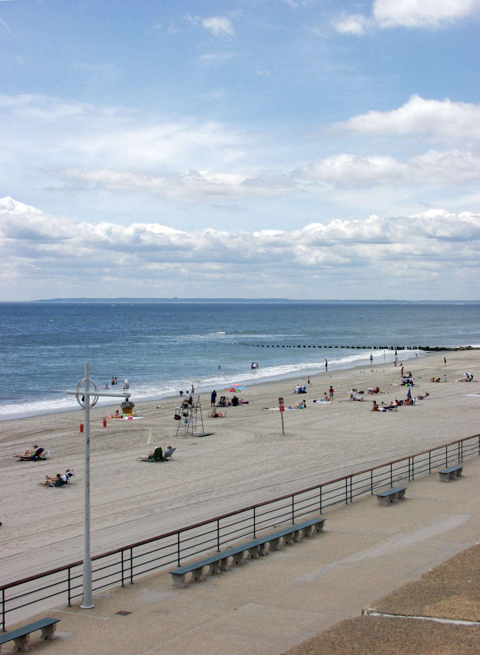 beach and boardwalk with people